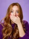 impressed speechless cute ginger girl hearing stunning gossip covering mouth form amazement shoo jpg