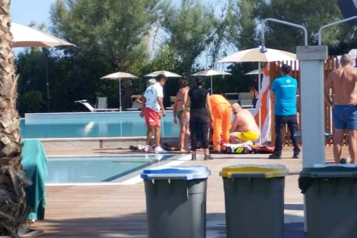 Momentele în care sportivul era resuscitat. foto: Profimedia