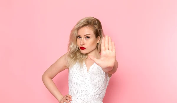 front view young beautiful lady white dress posing with stop sign jpg