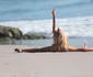 Daisy Lea does splits and other sexy yoga poses on the Beach jpeg