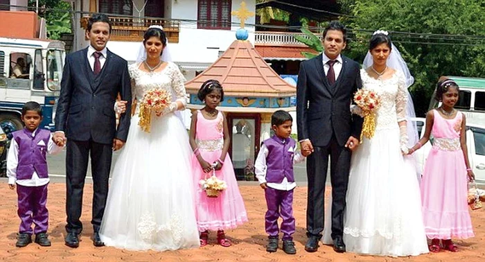 
    I-au cununat preoţii gemeni Rezi şi Rozy  Manaparambil   