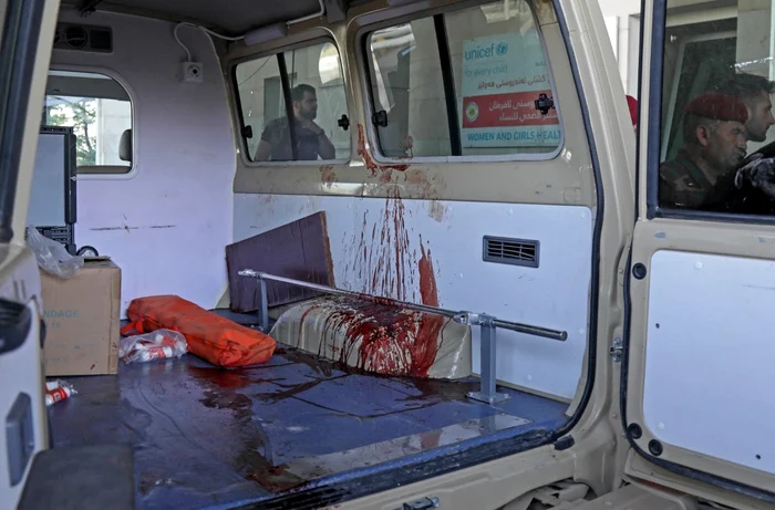 Ambulanță murdară de sânge după atacul iranian asupra kurzilor din Irak, în 28 septembrie Foto AFP