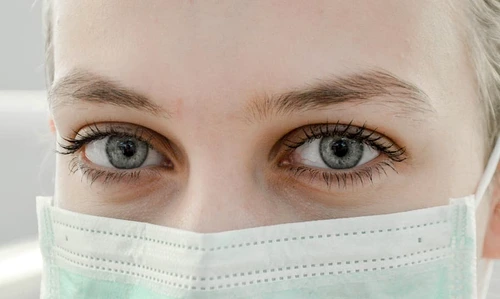 1 closeup photo of woman s eye wearing mask jpg jpeg