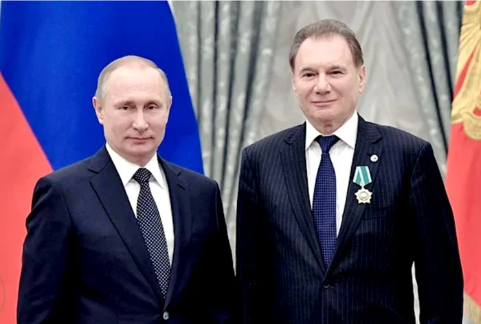 Vladimir Havinson (dreapta) alături de Vladimir Putin