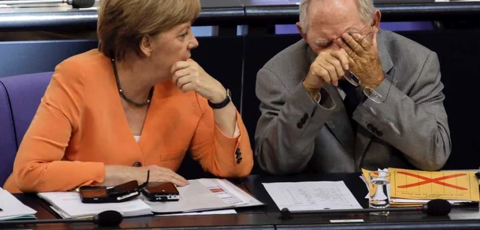 Cancelarul german Angela Merkel şi Wolfgang Schaeuble, ministrul de Finanţe al Germaniei, ţin în mâini soarta Greciei FOTO AFP