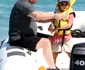 Elton John et son mari David Furnish au Club 55 à Saint Tropez avec leurs enfants Elijah et  Zachary jpeg