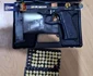 Pistol și cartușe/FOTO: DIICOT Iași