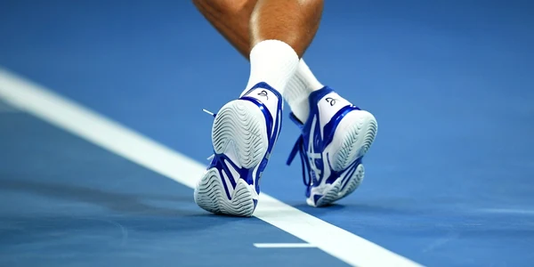 Picioarele sârbului Novak Djokovic sunt fotografiate în partida contra francezului Lucas Pouille în timpul turneului de tenis Australian Open la Melbourne Australia FOTO EPA-EFE / Lukas Coch