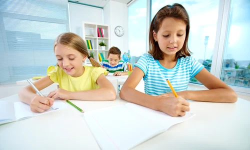 students working with their copybook jpg