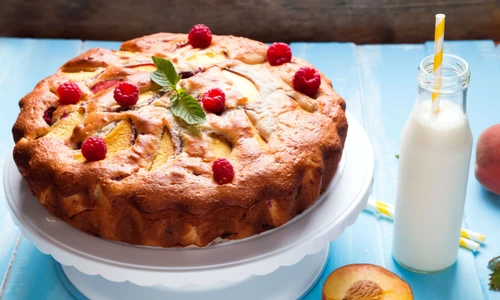 30391762   delicious pie with peaches and raspberry on the blue background jpeg