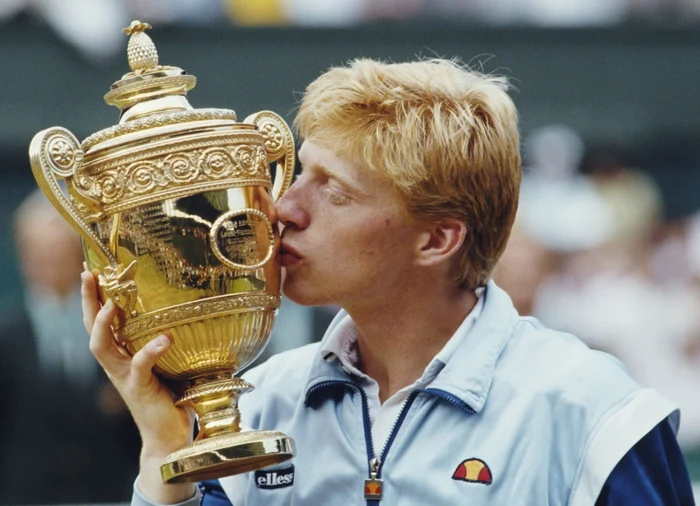 Boris Becker, cu unul dintre trofeele sale. Foto Getty Images