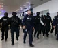 Vlad Baltateanu este escortat de politisti 5