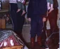 Mihai Trăistariu, în braţele surorii şi fratele lui Vasile ţinut la piept de tatăl lor