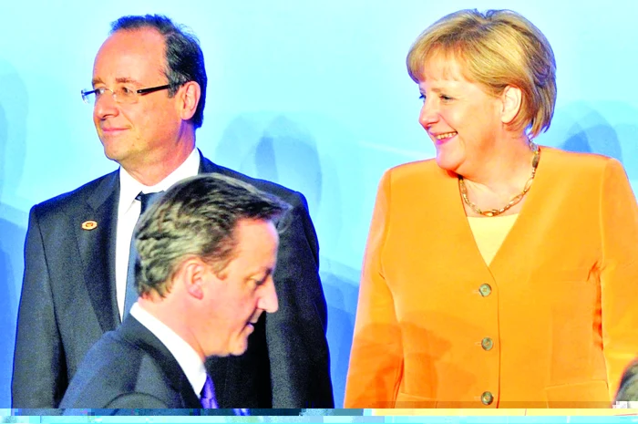 Preşedintele francez Francois Hollande, cancelarul german Angela Merkel şi premierul britanic David Cameron Foto Reuters