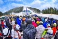 people stand before ski lift getty jpg