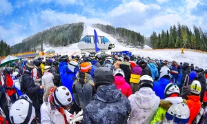 people stand before ski lift getty jpg