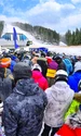 people stand before ski lift getty jpg