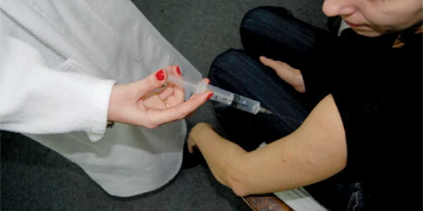 Una dintre persoanele vaccinate împotriva gripei