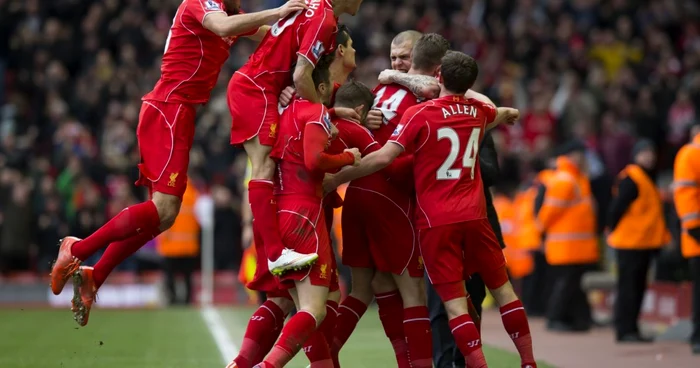 Bucuria jucătorilor de la Liverpool, în victoria cu City. FOTO: AP