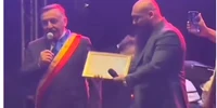 FOto Dani Mocanu, diploma de excelenta png