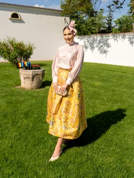 Andreea Gherasim la garden party la Palatul Elisabeta. FOTO: Instagram