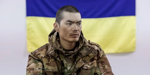 Prizonier chinez  interogat FOTO EPA EFE jpg