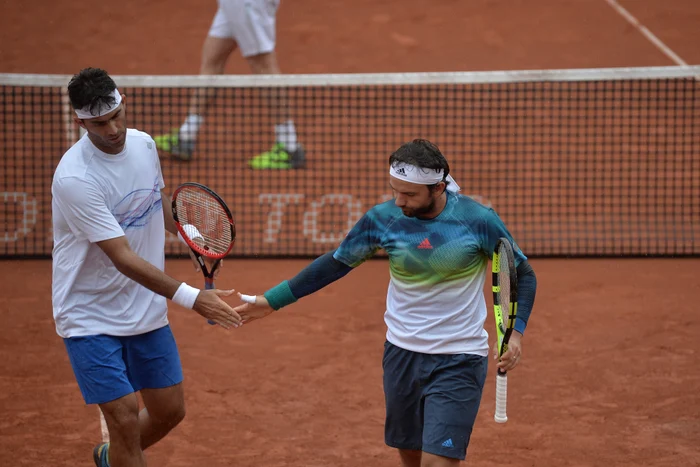 Români au câştigat în două seturi, 7-5, 6-4, finala întinsă pe două zileFoto: Mediafax