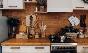 close up modern cozy kitchen white brown colors with stuff cooker decorative fir tree branches christmas decorations jpg