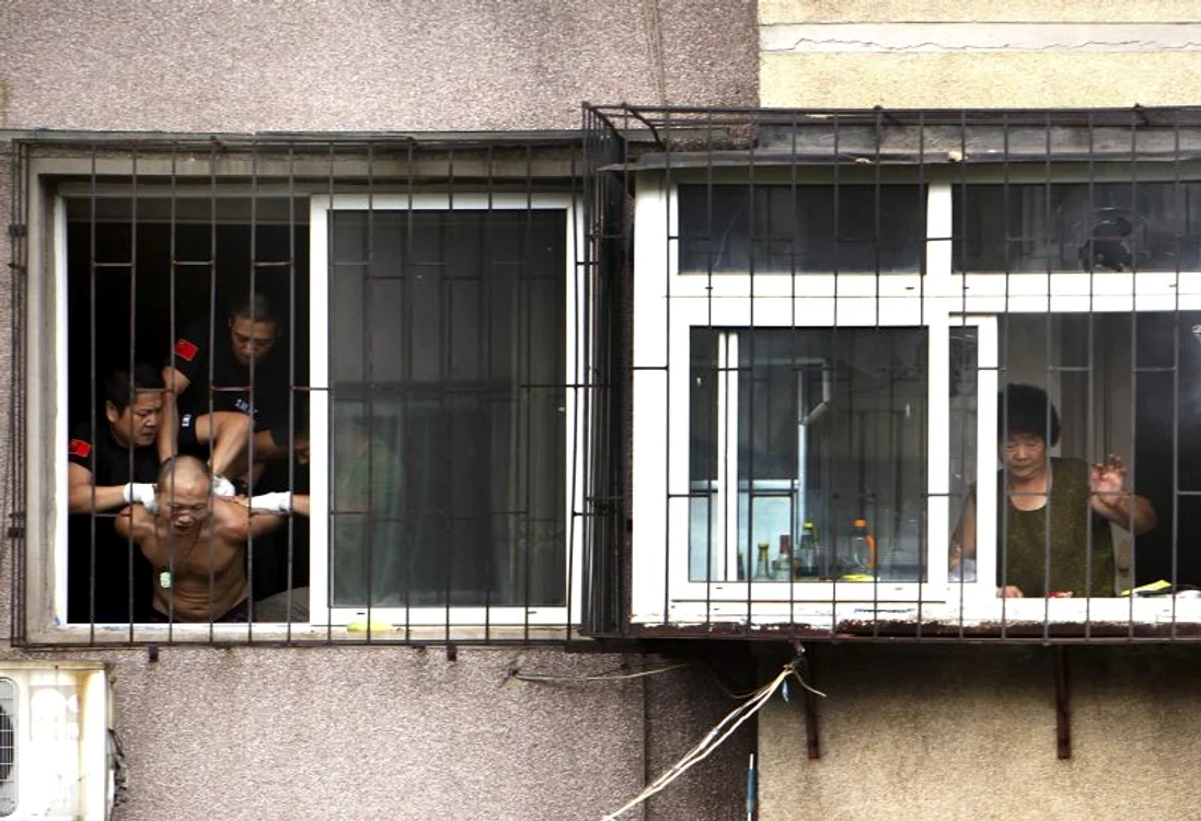 Chinez sinucigas (Foto: Reuters)