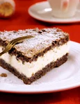 Piece of poppy seed cake with cream filling jpeg