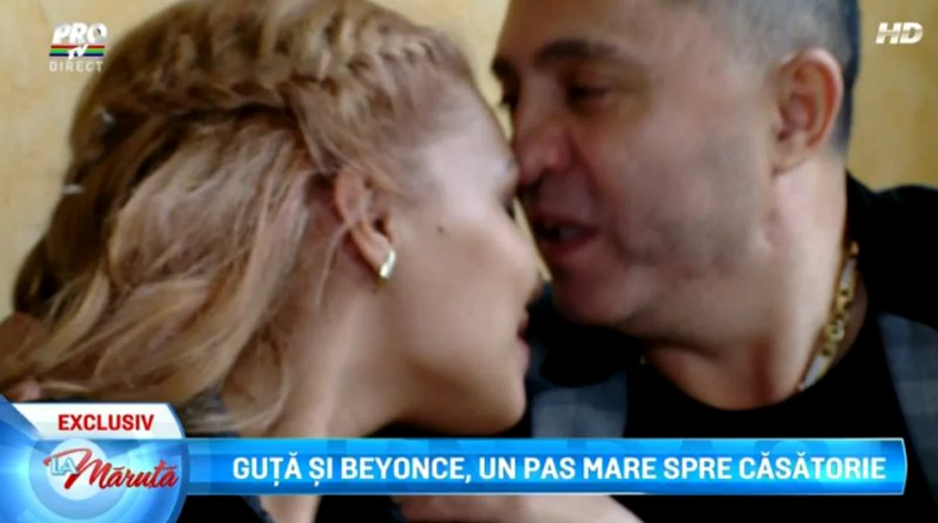 Guţă a copleşit-o cu sărutări pe blondă