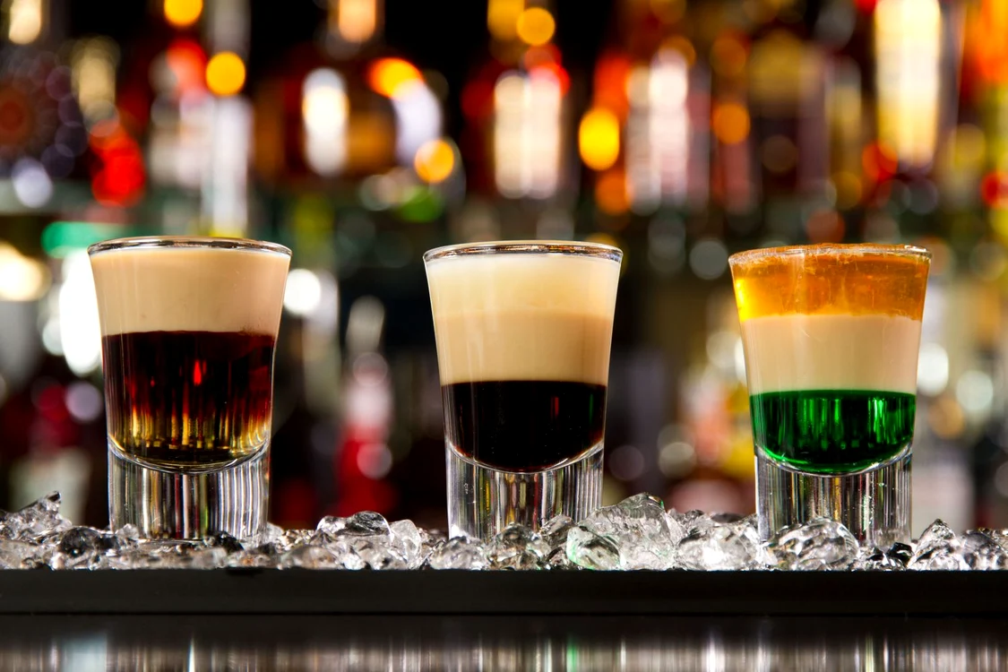 24650502   three layered shots on a bar counter top jpeg