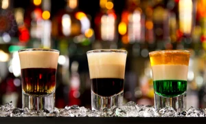 24650502   three layered shots on a bar counter top jpeg