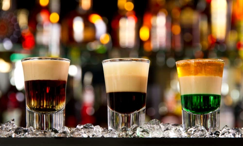 24650502   three layered shots on a bar counter top jpeg