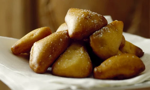 Olive oil flavored pumpkin fritters with lemon and orange zests jpeg