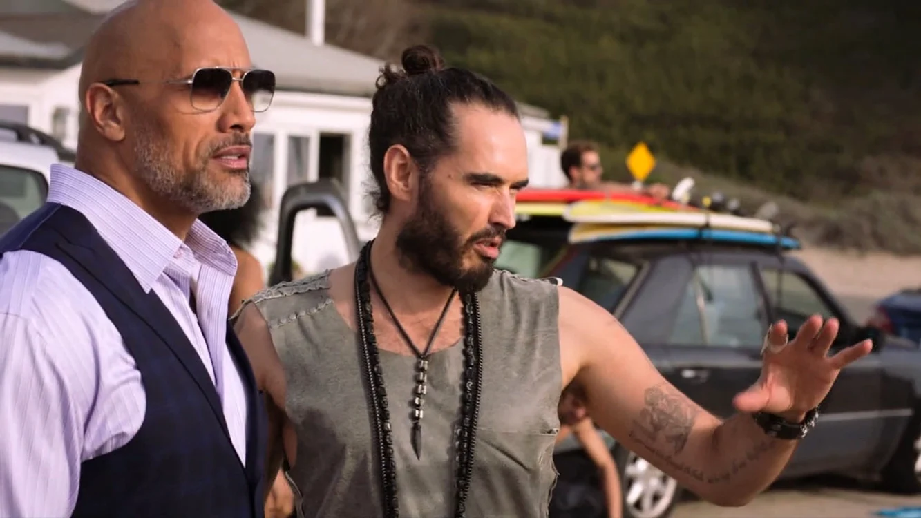 CONTROVERSIAL funnyman Russell Brand strips off during his first appearance on US comedy drama Ballers jpeg