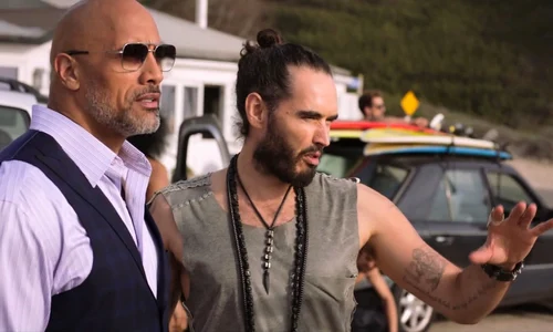 CONTROVERSIAL funnyman Russell Brand strips off during his first appearance on US comedy drama Ballers jpeg