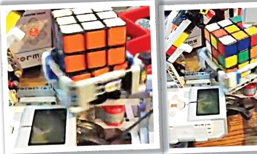 Roboţelul scanează întâi toate faţetele cubului, apoi îl răsuceşte  până când potriveşte culorile  jpeg