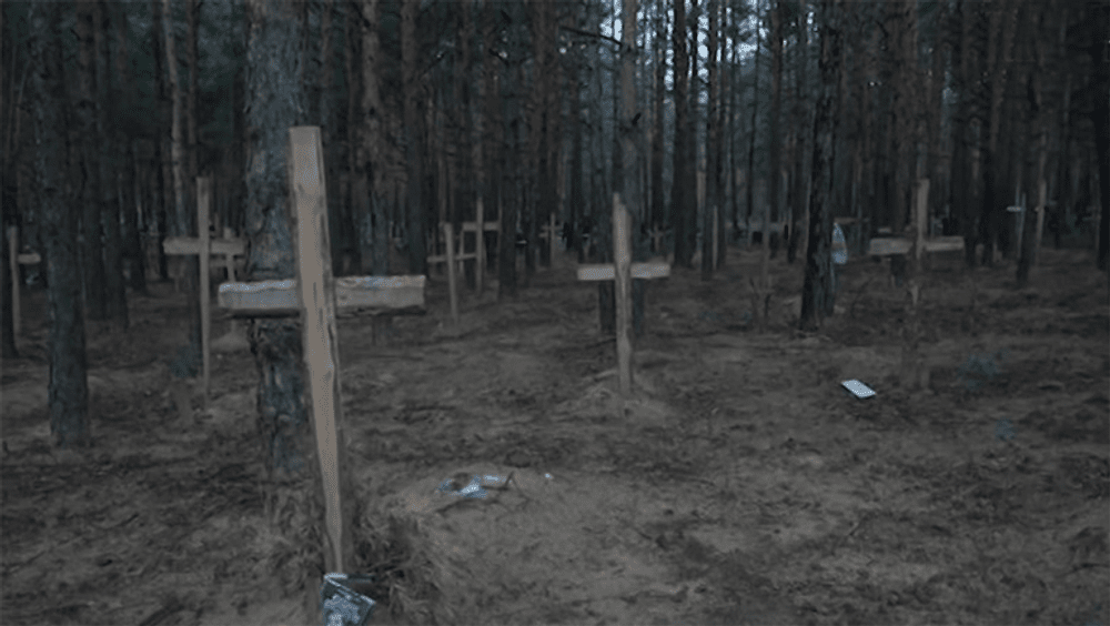 Ucraina investighează o posibilă groapă comună aproape de frontiera cu Rusia