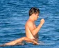 Leonardo Dicaprio appears self conscious when spotted shirtless in Malibu jpeg