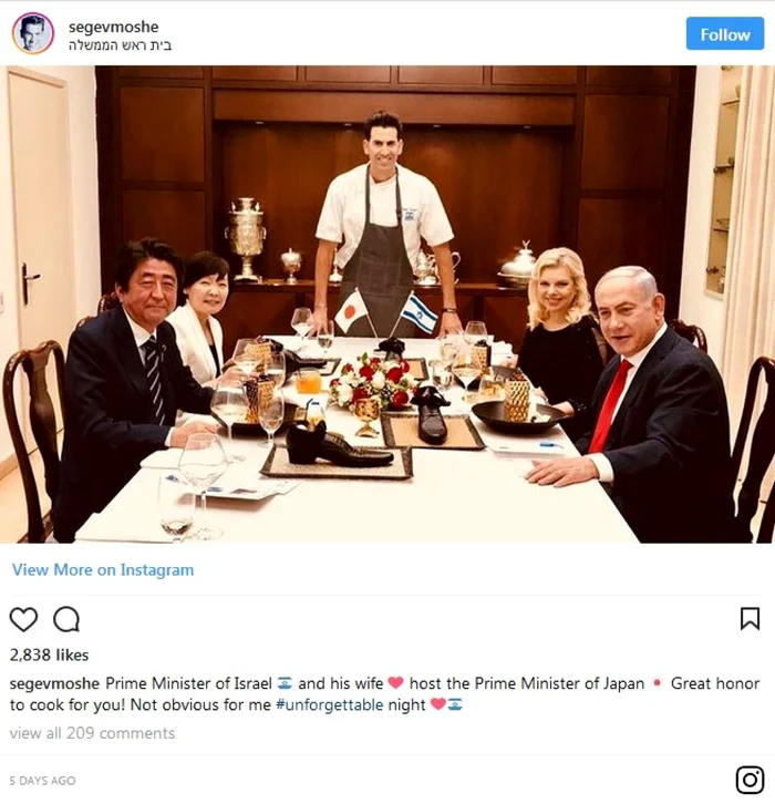 Premierul nipon Shinzo Abe si premierul israelian Benjamin Netanyahu servind praline de ciocolata in pantofi