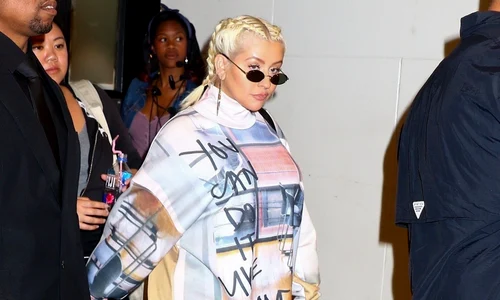 Christina Aguilera is surrounded by security as she leaves MTV studios in New York jpeg