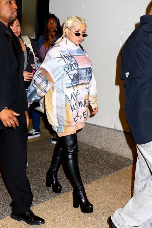 Christina Aguilera is surrounded by security as she leaves MTV studios in New York jpeg