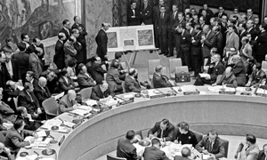 Adlai Stevenson shows missiles to UN Security Council with David Parker standing jpg