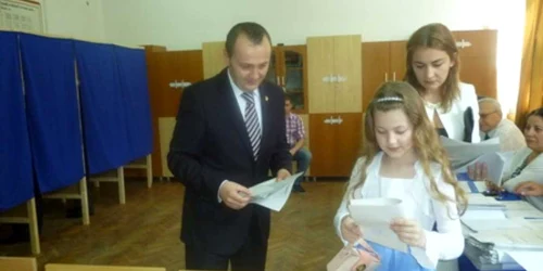 Claudiu Pop alături de soţie şi fiică