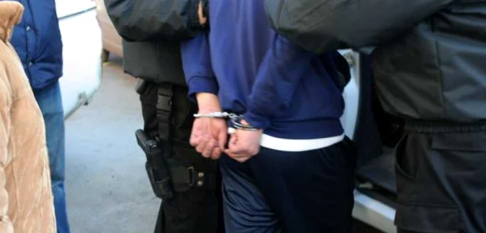 Grupul coordonat de Paul Valută a fost dus în spatele gratiilor