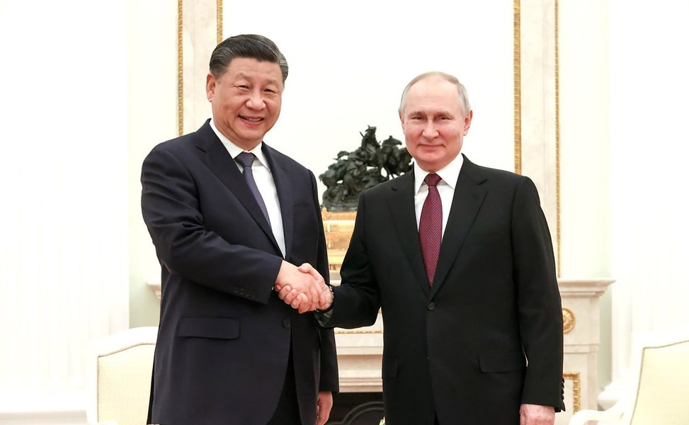 Dineul dictatorilor: Putin și Xi au mâncat împreună tocană „fericirea familiei”. Meniul complet de la masa celor doi șefi de stat