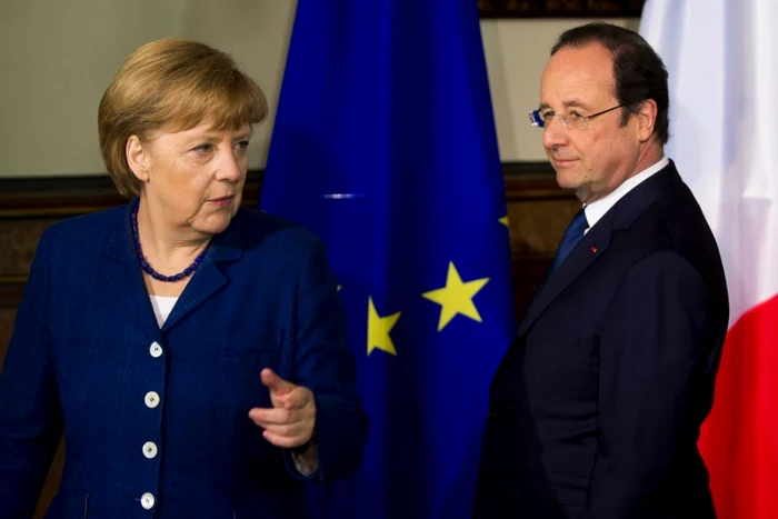 Cancelarul german Angela Merkel şi preşedintele francez Francois Hollande, liderii a două dintre statele care se opun introducerii pe agenda JAI din 8-9 octombrie a aderării României şi Bulgariei la spaţiul Schengen. FOTO Reuters