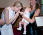 Prințesa Charlene de Monaco, drăgăstoasă cu un bebeluș.