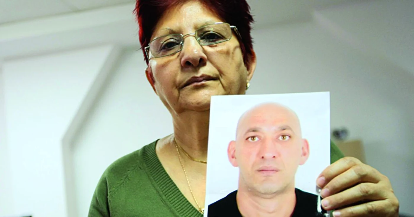 Iuliana Puiu nu are linişte nici după ce a fost de acord cu prelevarea organelor fiului ei. Foto: Sebastian Tătaru